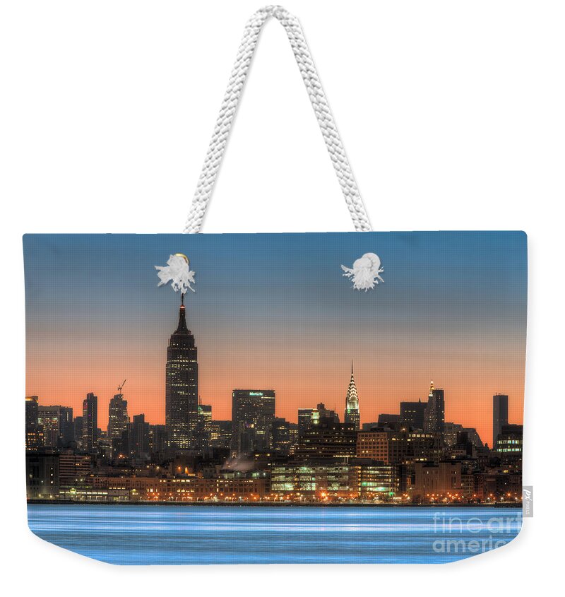 Clarence Holmes Weekender Tote Bag featuring the photograph Manhattan Skyline and Pre-Sunrise Sky I by Clarence Holmes