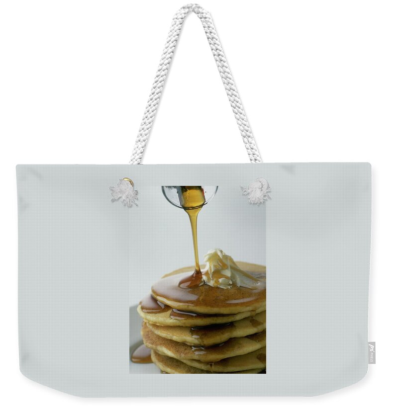 Maple Syrup Being Poured Onto A Stack Of Pancakes Weekender Tote Bag