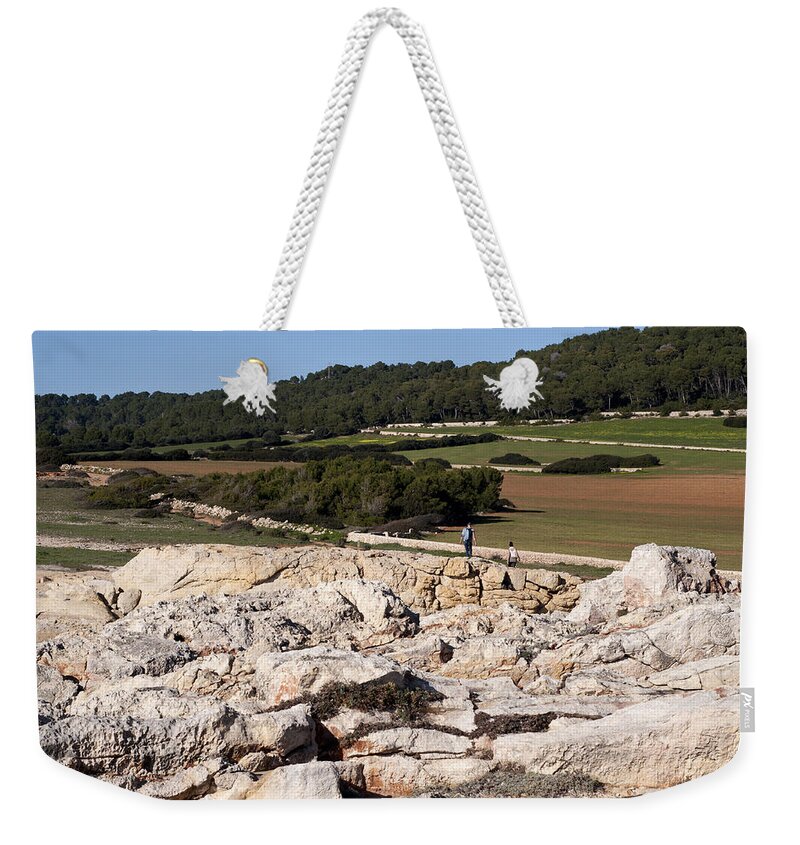 Agriculture Weekender Tote Bag featuring the photograph A walk among rocks trees and green land in Minorca - Marvelous walkabout by Pedro Cardona Llambias