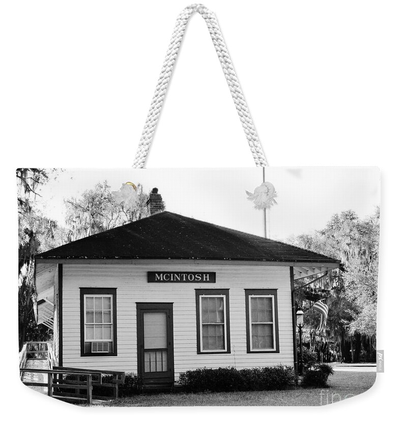 1885 Weekender Tote Bag featuring the photograph Mc Intosh Train Depot B W by D Hackett
