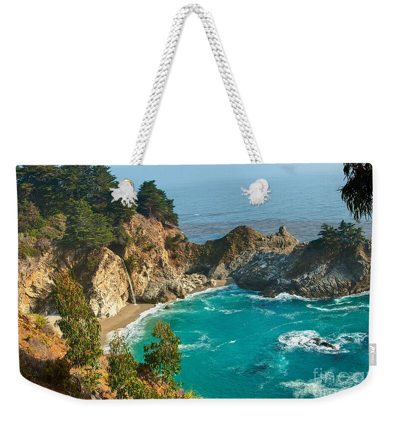 Mcway Falls Weekender Tote Bag featuring the photograph McWay Falls along the Big Sur Coast. by Jamie Pham