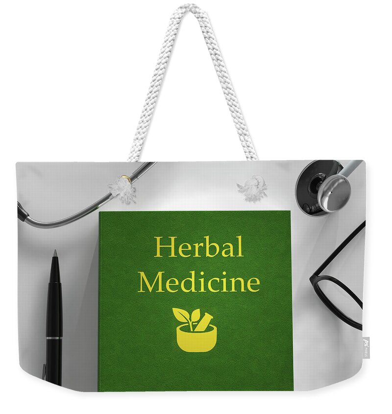 Alternative Weekender Tote Bag featuring the photograph Medical Book About Herbal Medicine by Ikon Images