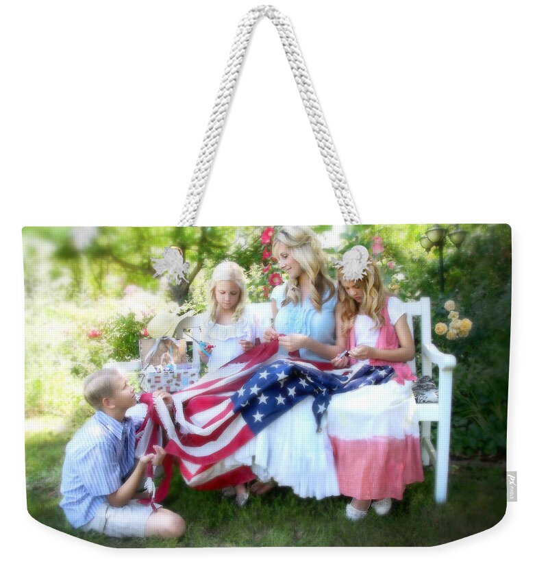 Flag Weekender Tote Bag featuring the photograph Mending Liberty by Helen Thomas Robson
