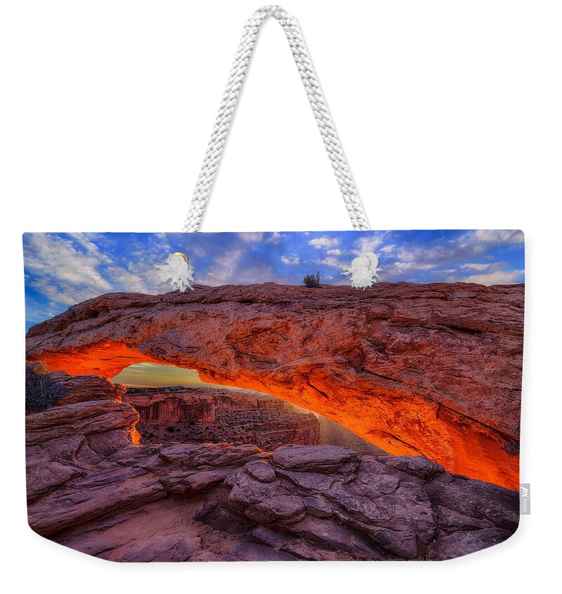 Mesa Arch Weekender Tote Bag featuring the photograph Mesa Arch Glow by Greg Norrell