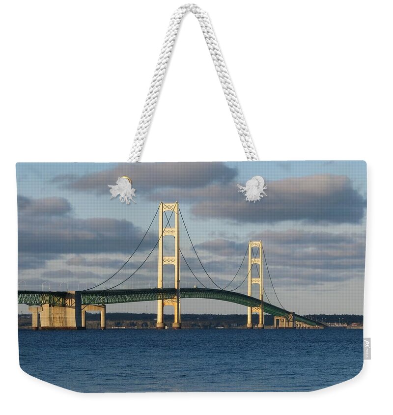 Mackinac Bridge Weekender Tote Bag featuring the photograph Mighty Mac in December by Keith Stokes