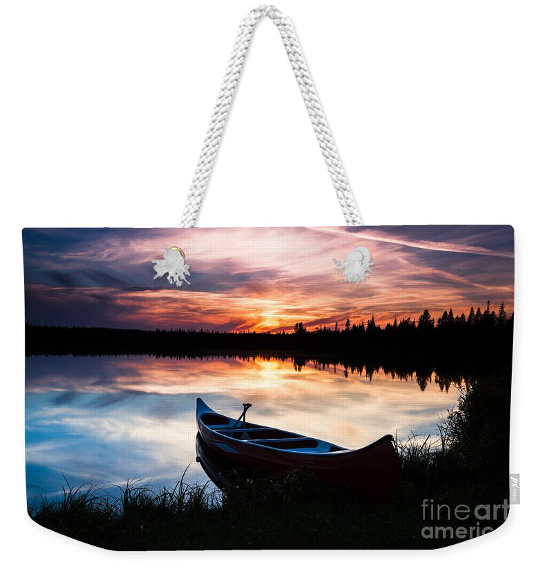 Moose Lake Weekender Tote Bag featuring the photograph Minnesota sunset by Lori Dobbs