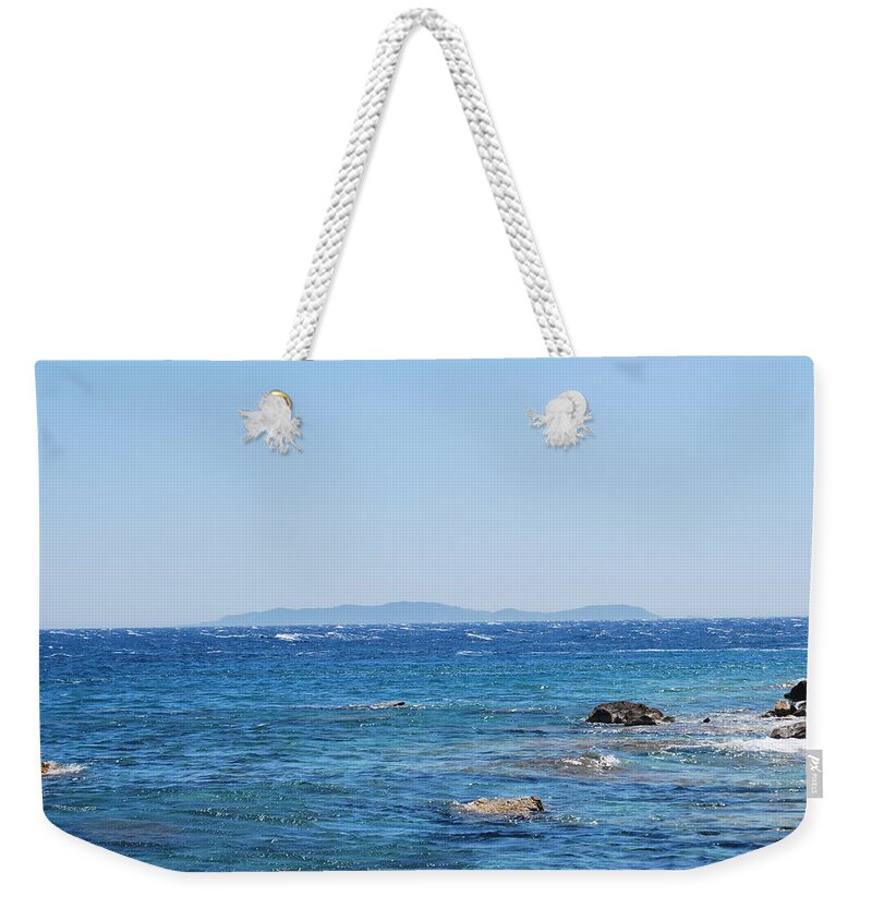 Mistral Wind Weekender Tote Bag featuring the photograph Mistral.Force 6 by George Katechis