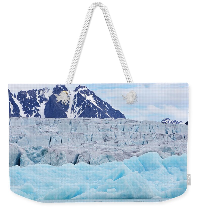 Tranquility Weekender Tote Bag featuring the photograph Monaco Glacial Ice In Spitsbergen by Anna Henly