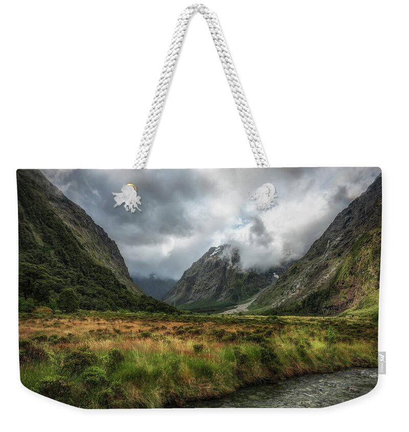 Scenics Weekender Tote Bag featuring the photograph Monkey Creek | Fiordland, New Zealand by Copyright Lorenzo Montezemolo