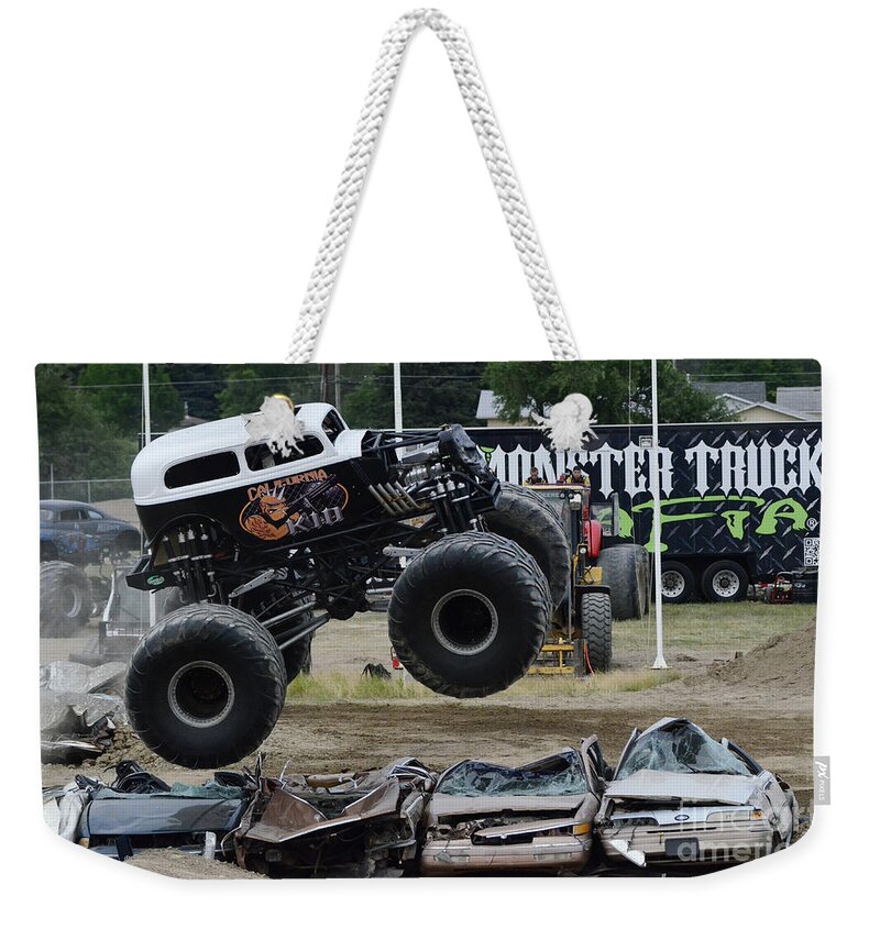 Monster Weekender Tote Bag featuring the photograph Monster Trucks Size Matters 1 by Bob Christopher