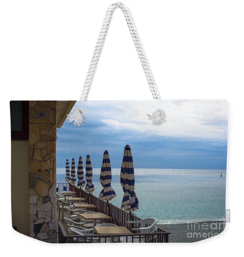 Monterosso Italy Weekender Tote Bag featuring the photograph Monterosso Outdoor Cafe by Prints of Italy