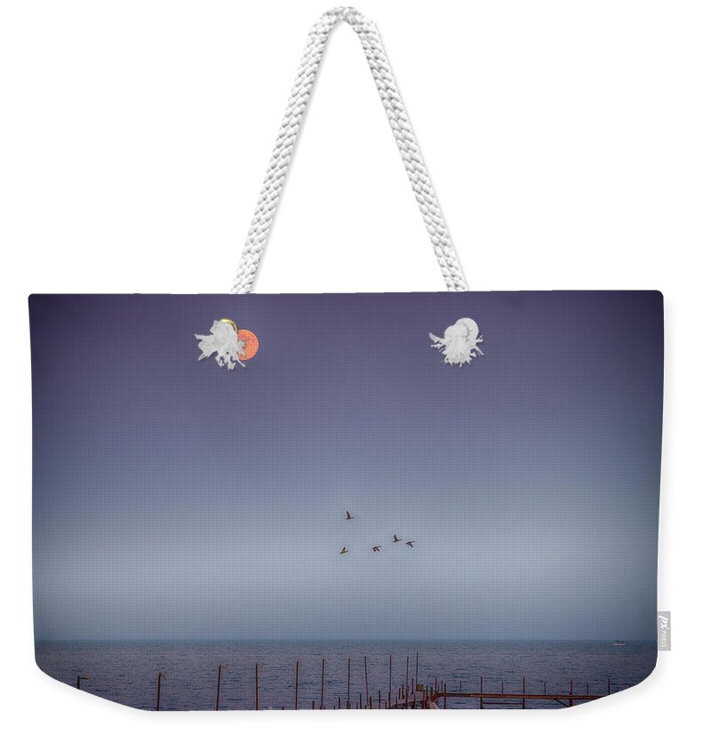 Moon Weekender Tote Bag featuring the photograph Moon Over Lake Mille Lacs by Paul Freidlund