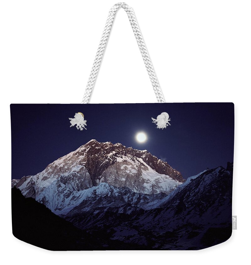 Feb0514 Weekender Tote Bag featuring the photograph Moon Over Nuptse Nepal by Colin Monteath