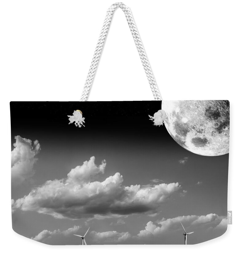 Black Weekender Tote Bag featuring the photograph Moon Power by Semmick Photo