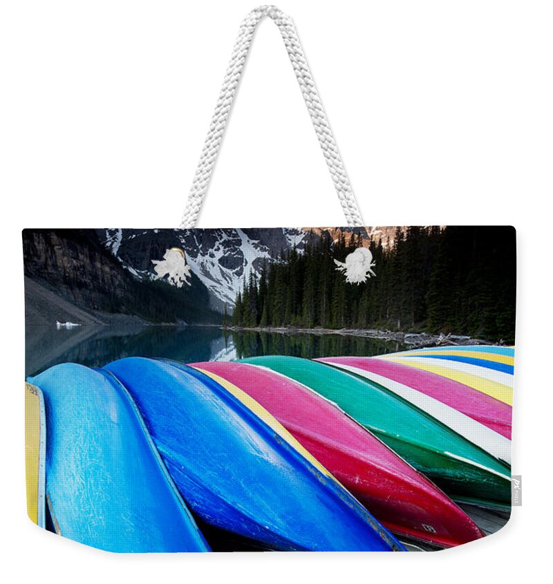 Photography Weekender Tote Bag featuring the photograph Moraine lake canoes by Ivy Ho
