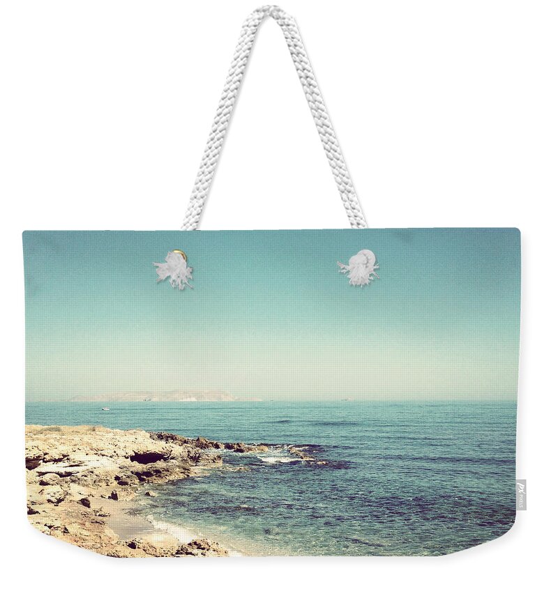 Tranquility Weekender Tote Bag featuring the photograph Morning Beach by Seiphotos