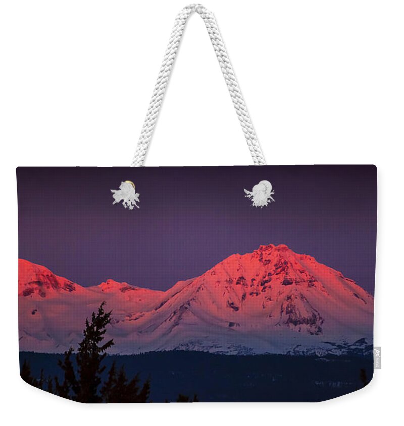 Three Sisters Sunrise Mountain Photographs Weekender Tote Bag featuring the photograph Morning Dawn on Two Of Three Sisters Mountain Tops In Oregon by Jerry Cowart