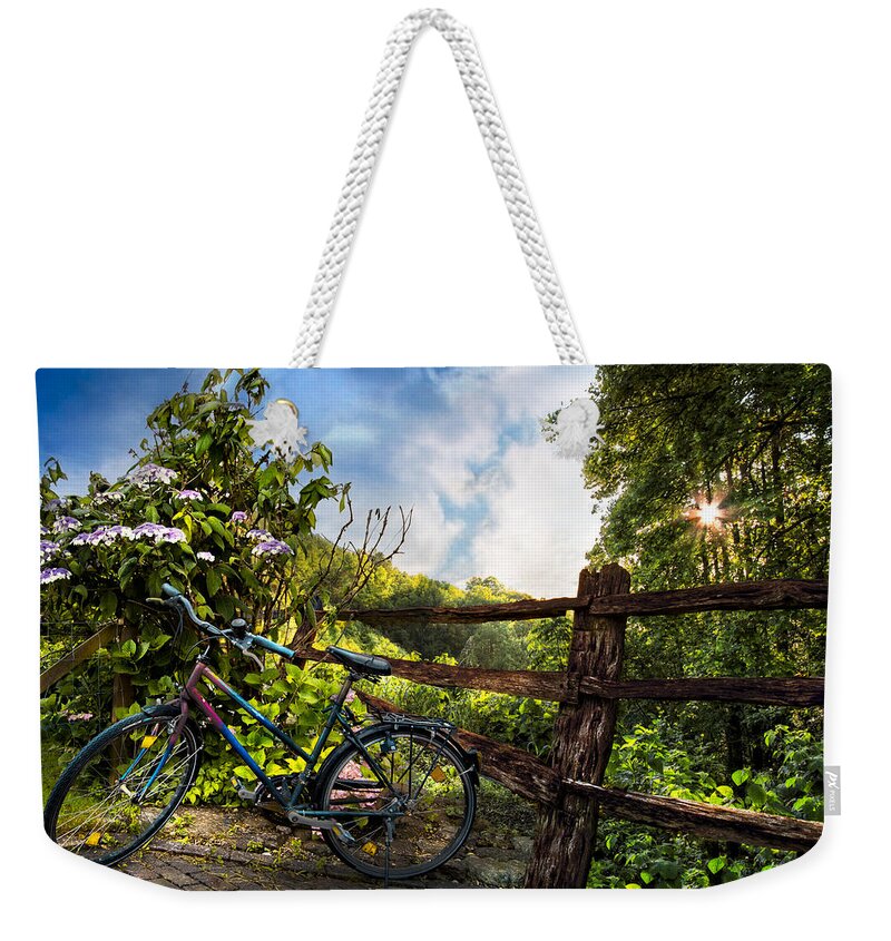 Appalachia Weekender Tote Bag featuring the photograph Morning Ride by Debra and Dave Vanderlaan