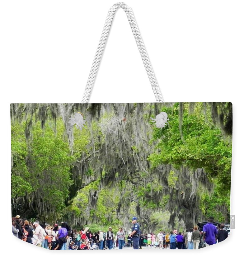Candice Glover Weekender Tote Bag featuring the photograph Moss and Massive Crowd by Patricia Greer