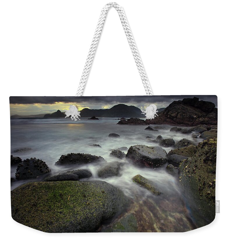 Rock Music Weekender Tote Bag featuring the photograph Mossy Rocks In Lombok by Ali Trisno Pranoto