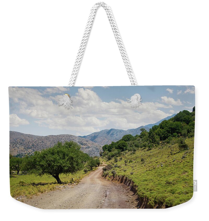 Tranquility Weekender Tote Bag featuring the photograph Mountain Dirt Road In Northern Crete by Ed Freeman