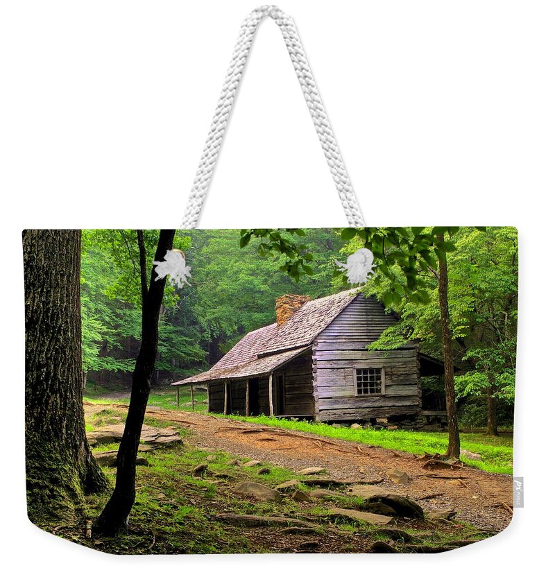 Rustic Weekender Tote Bag featuring the photograph Mountain Hideaway by Frozen in Time Fine Art Photography