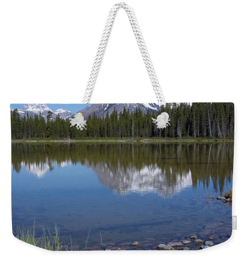 Mountain Weekender Tote Bag featuring the photograph Mountain Lake in Kananaskis Alberta by Bill Cubitt