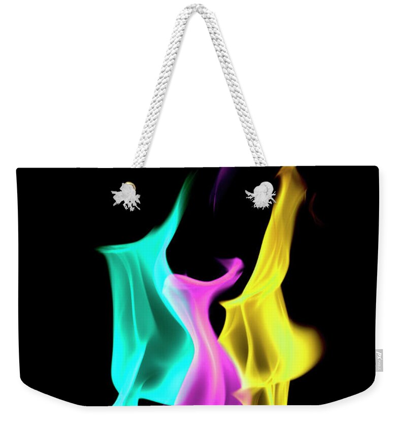 In A Row Weekender Tote Bag featuring the photograph Multi Colored Flames by Pm Images