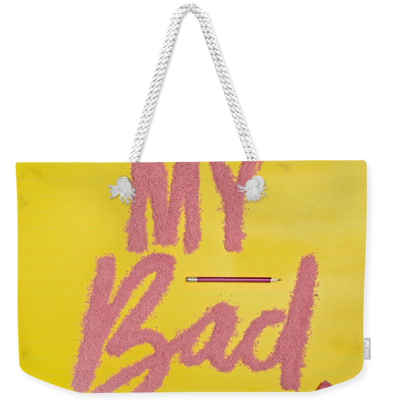 Mistake Weekender Tote Bag featuring the photograph My Bad Spelled Out In Eraser Crumbs by Juj Winn