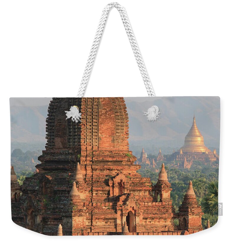 Theravada Weekender Tote Bag featuring the photograph Myanmar Temples On The Bagan Plain In by Alantobey