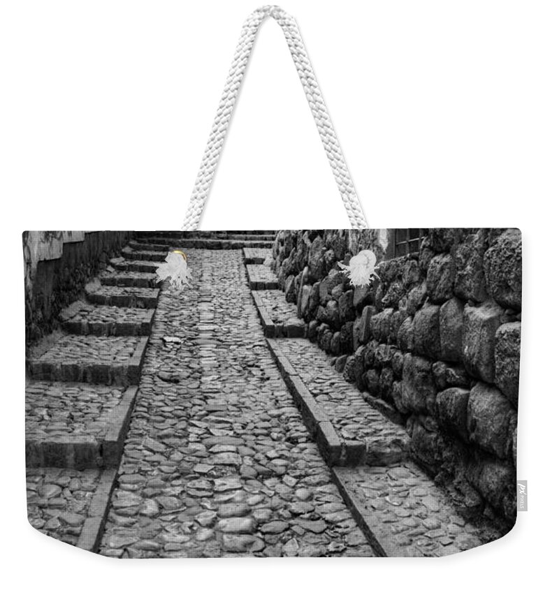 Street Weekender Tote Bag featuring the photograph Narrow street in Cusco by Alexey Stiop