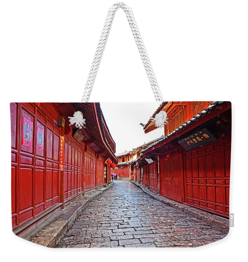 Built Structure Weekender Tote Bag featuring the photograph Narrow Streets Of Old Town by John W Banagan