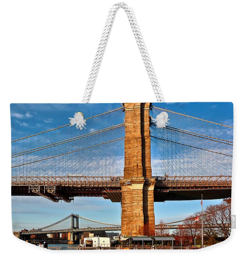 Amazing Brooklyn Bridge Photos Weekender Tote Bag featuring the photograph New York Bridges Lit by Golden Sunset by Mitchell R Grosky