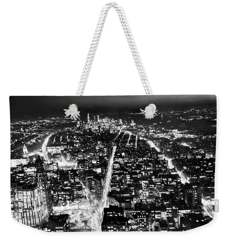 1950s Weekender Tote Bag featuring the photograph New York City At Night by Underwood Archives