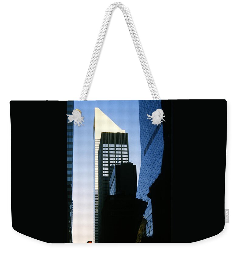 New York Weekender Tote Bag featuring the photograph New York City Skyline No 4 by Gordon James