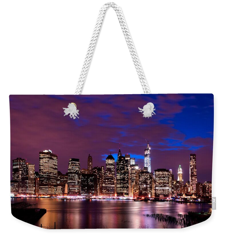 New York Weekender Tote Bag featuring the photograph New York Skyline Magic Hour-- from Brooklyn Heights Promenade by Mitchell R Grosky