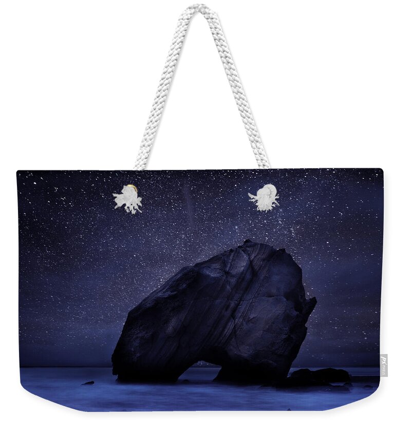 Night Weekender Tote Bag featuring the photograph Night guardian by Jorge Maia