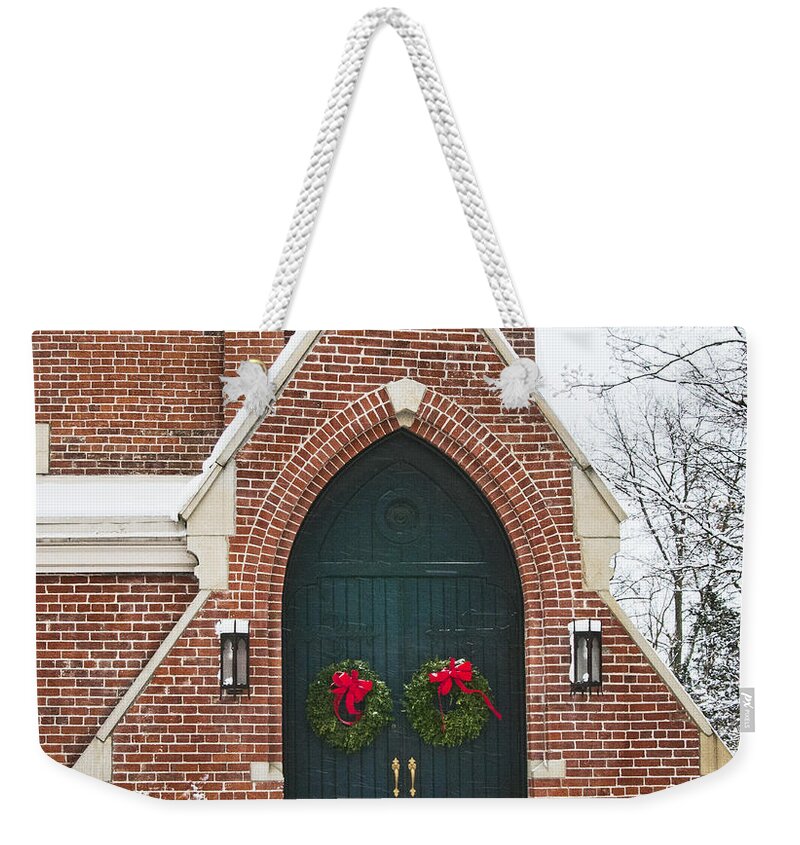 Norman Church Door Weekender Tote Bag featuring the photograph Norman Church Door by Phyllis Taylor