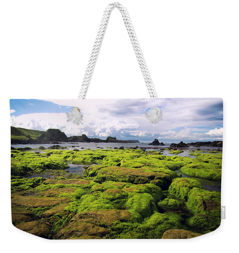 Seaweed Weekender Tote Bag featuring the photograph Northern Ireland by Haoliang