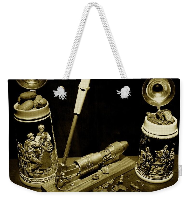 Michael Tidwell Photography Weekender Tote Bag featuring the photograph Nut Cracker with Steins by Michael Tidwell