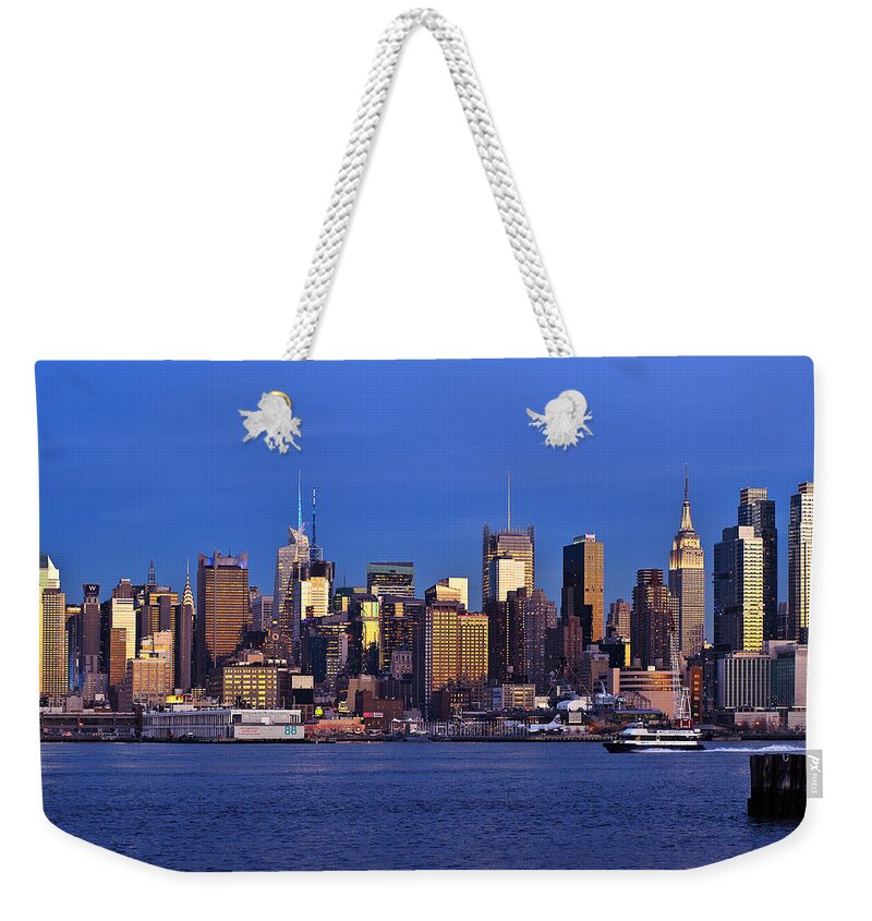 Best New York Skyline Photos Weekender Tote Bag featuring the photograph NY Skyline at Twilight by Mitchell R Grosky