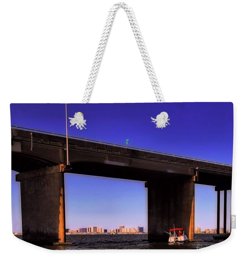 Skyline Weekender Tote Bag featuring the photograph O.C. Bridge n Skyline by Robert McCubbin