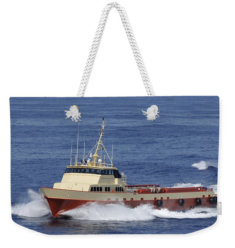 Crew Boat Weekender Tote Bag featuring the photograph Offshore supply vessel by Bradford Martin