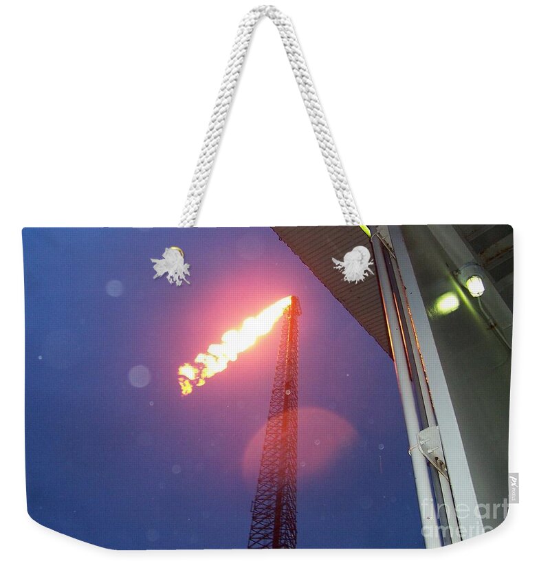 Louisiana Weekender Tote Bag featuring the photograph Oil Platform Flare Boom During Hurricane Cindy Off The Coast Of Louisiana In The Gulf of Mexico by Michael Hoard