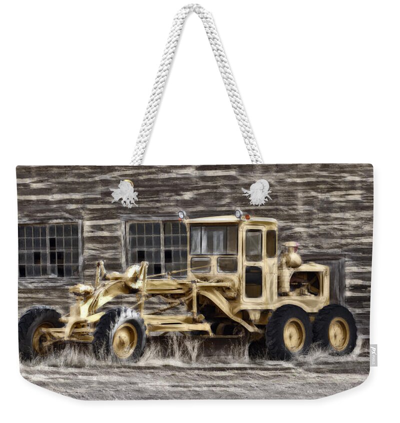 Old Cat Grader Weekender Tote Bag featuring the photograph Old Cat Grader by Wes and Dotty Weber