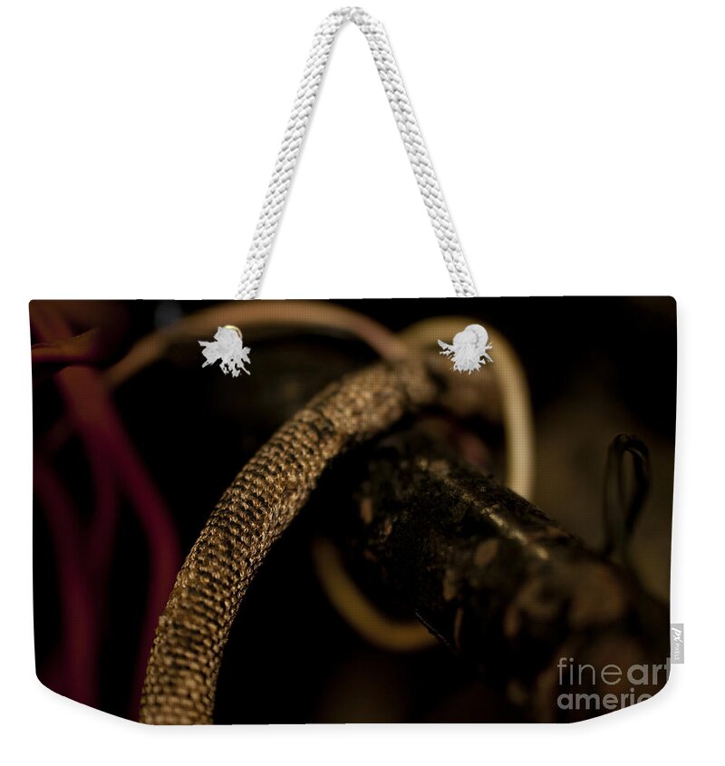 Wires Weekender Tote Bag featuring the photograph Old Frayed Wires by Wilma Birdwell