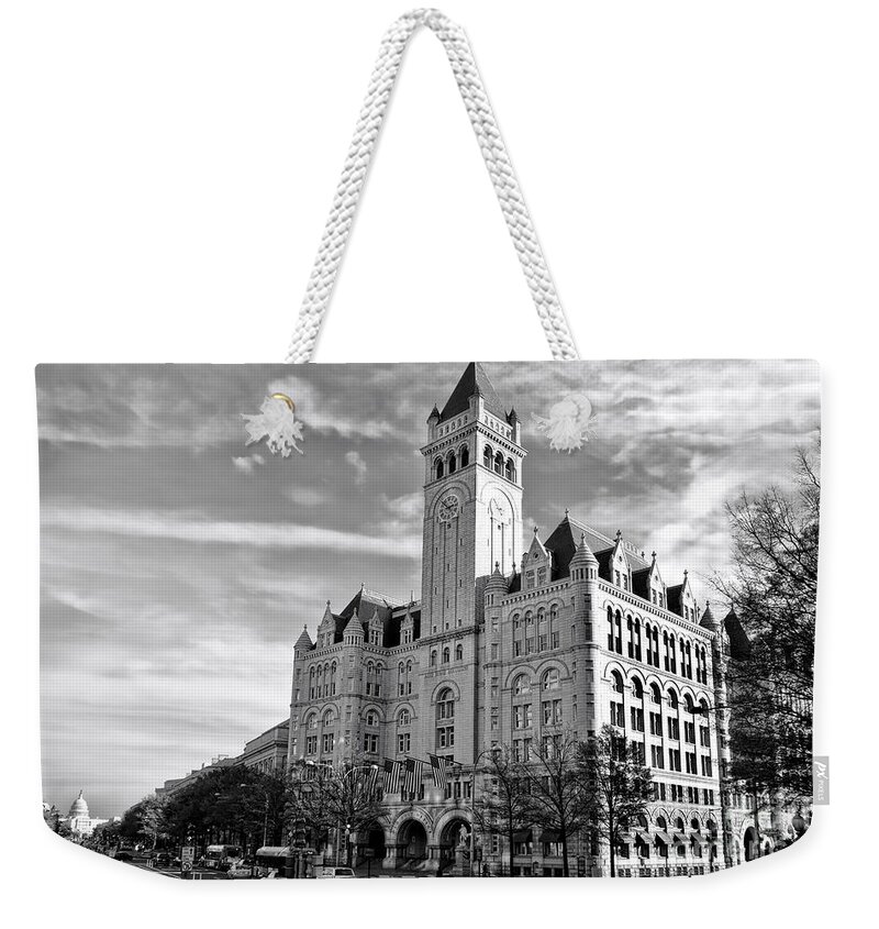 Washington Weekender Tote Bag featuring the photograph Old Post Office and Pennsylvania Avenue by Olivier Le Queinec