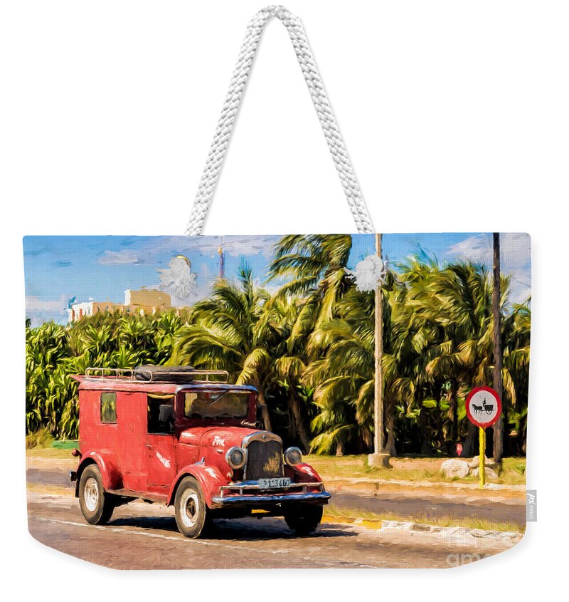 Cuba Weekender Tote Bag featuring the photograph Old red Ford by Les Palenik