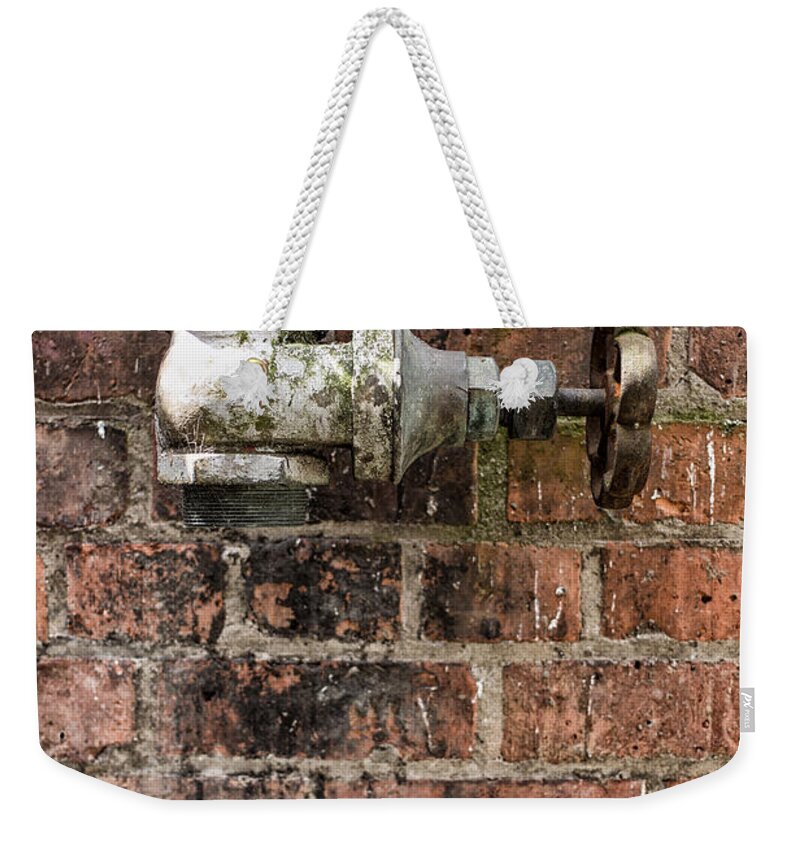 Urban Weekender Tote Bag featuring the photograph Old valve by Nigel R Bell