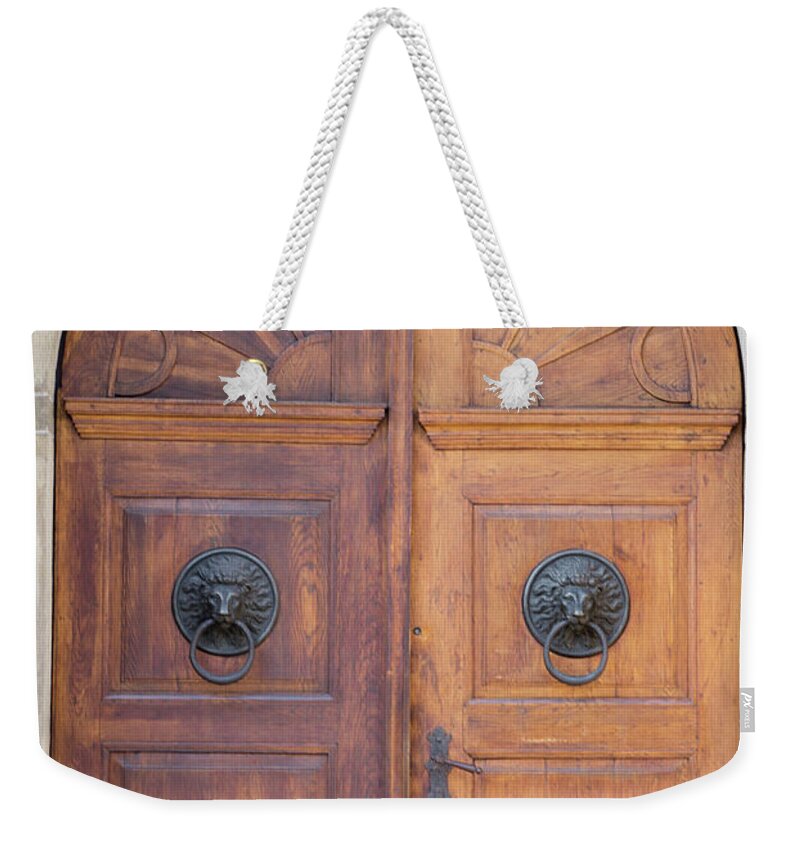 Arch Weekender Tote Bag featuring the photograph Old Vintage Wooden Brown Door Close-up by Bogdan Khmelnytskyi